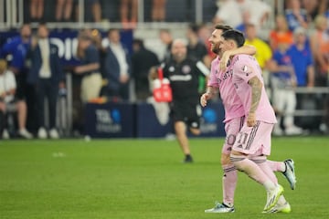 Lionel Messi (10) celebrates with midfielder Facundo Farias (11) after defeating FC Cincinnati at TQL Stadium.